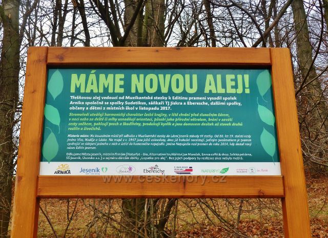 Jeseník, Muzikantská stezka - informační tabule u nově vysázené třešňové aleje