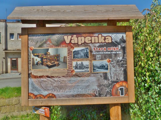 Skuhrov nad Bělou - panel "Vápenka", Starý mlýn před budovou společenského centra